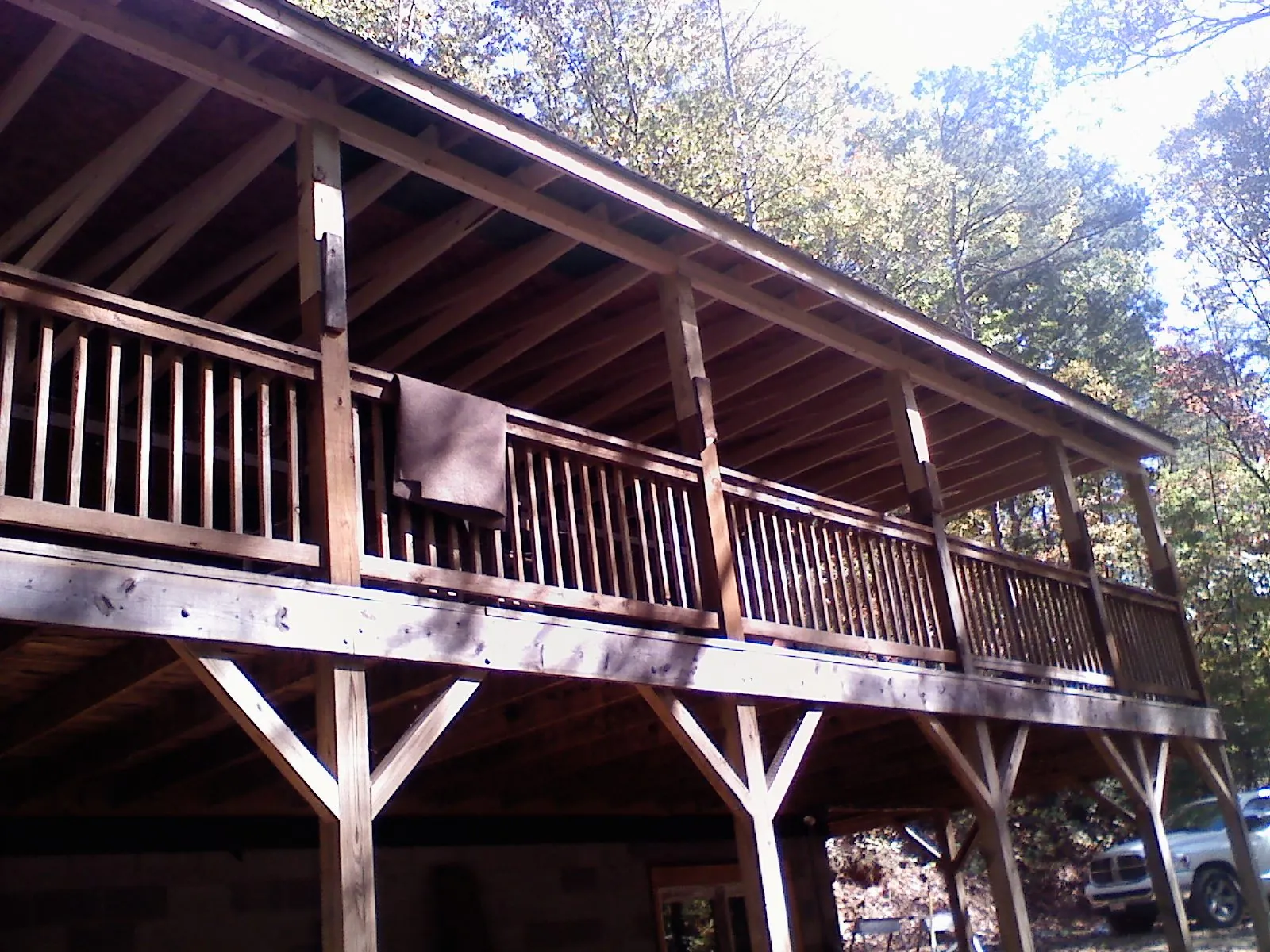 Timber framing under a new elevated porch and deck — Roof Leak Repair in Keene by Roofing Brothers